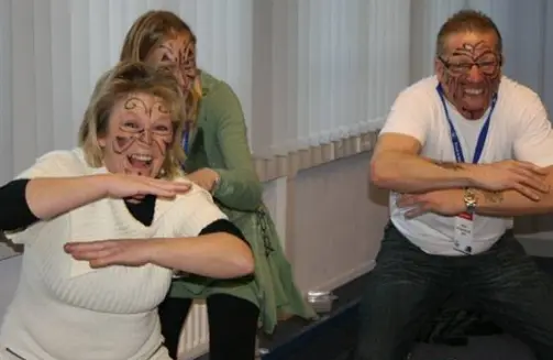 employees doing the haka as a guided activity'